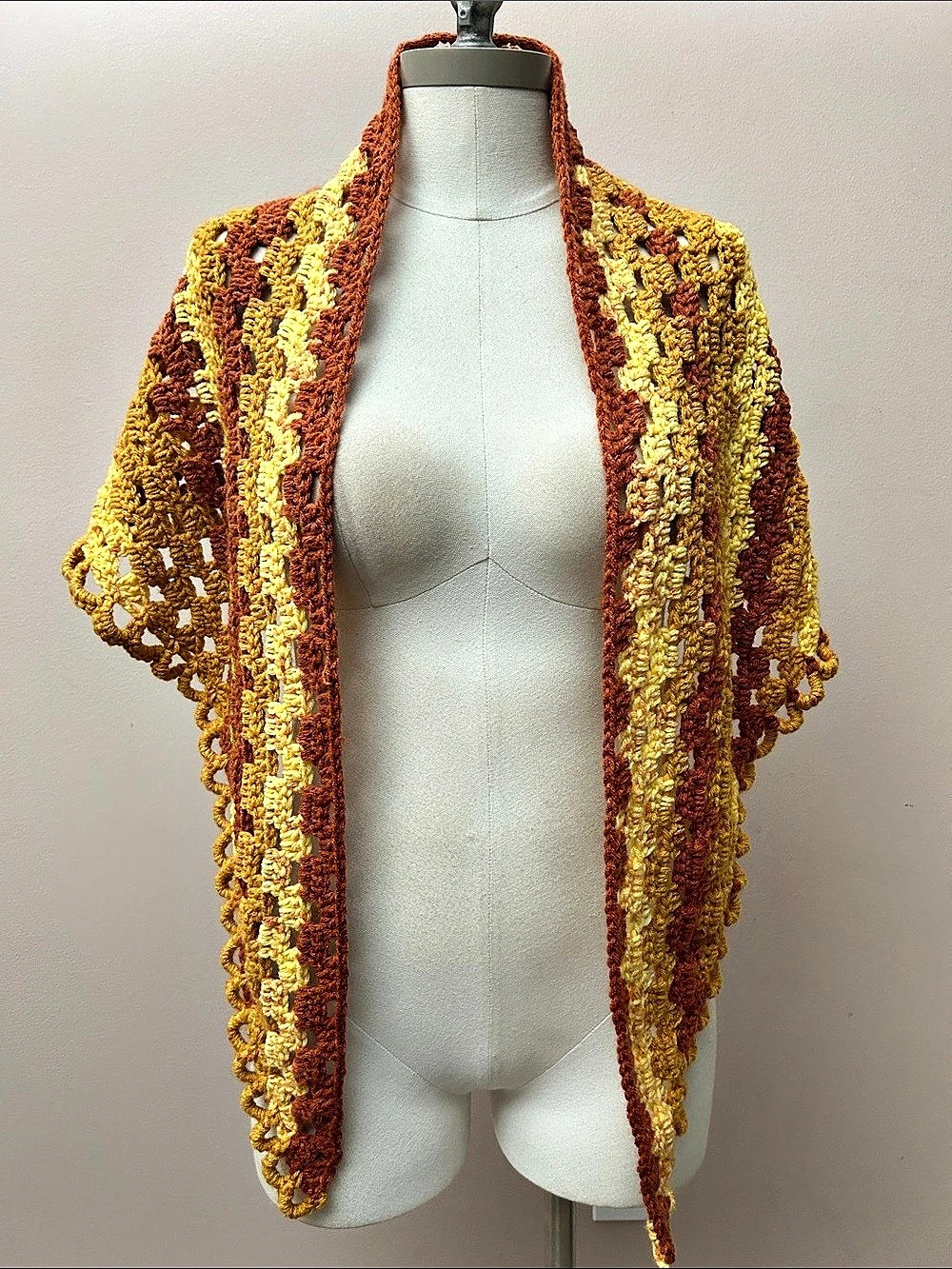 handmade crochet open-stitch wrap or shawl in a
Brown, yellow, and cream color-b